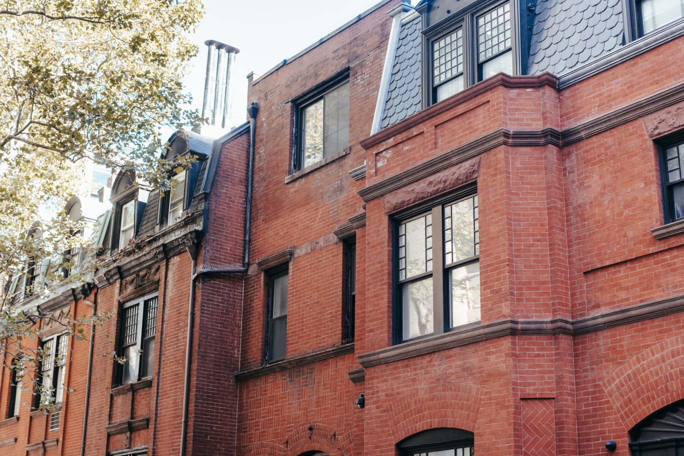 The exterior of a well-kept home with fresh, clean paint